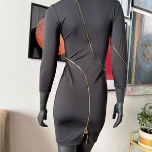 Most head turning. Black Dress with Gold zippers